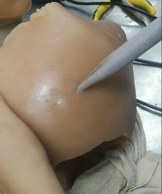 How to repair a small cut of TPE doll simply with a soldering iron